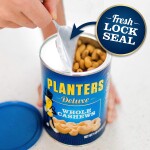 PLANTERS Deluxe Whole Cashews, 18.25 oz. Resealable Jar - Wholesome Snack Roasted in Peanut Oil with Sea Salt - Nutrient